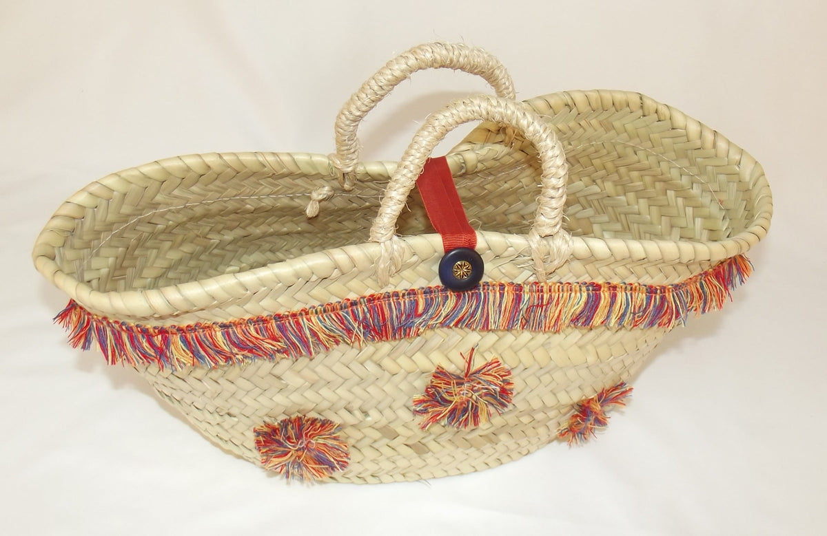Detalle de los pompones y flecos del capazo Esencia del Mediterráneo